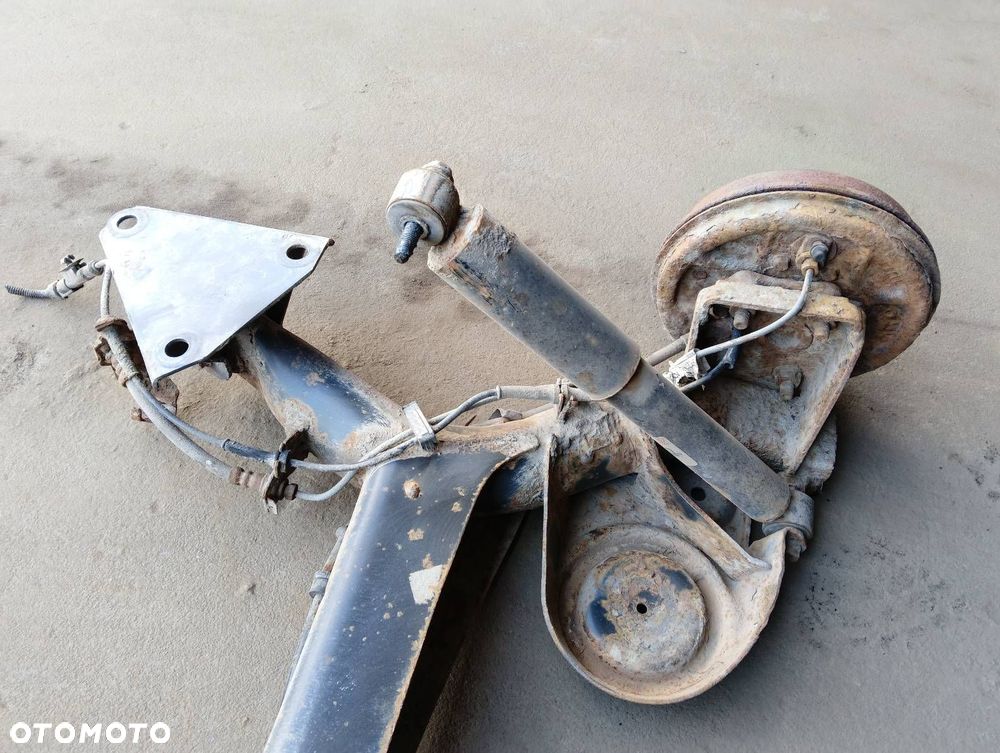 BELKA OŚ ZAWIESZENIA TYŁ BĘBNY Z ABS FIAT PANDA II - 2