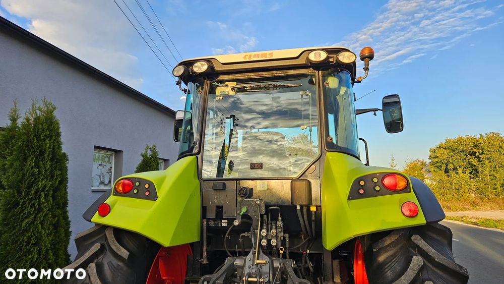 Claas Arion 410 - 12