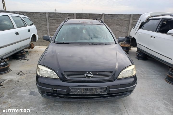 Far stanga Opel Astra G [1998 - 2009] wagon 5-usi 1.7 CDTi MT (80 hp) - 2
