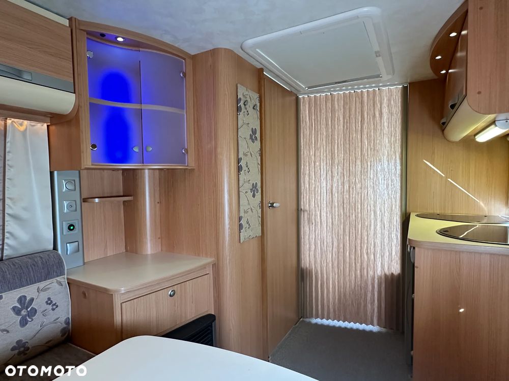 Adria ADORA 472 LU z napędem i markizą ze ścianami.  DMC 1300 - 18