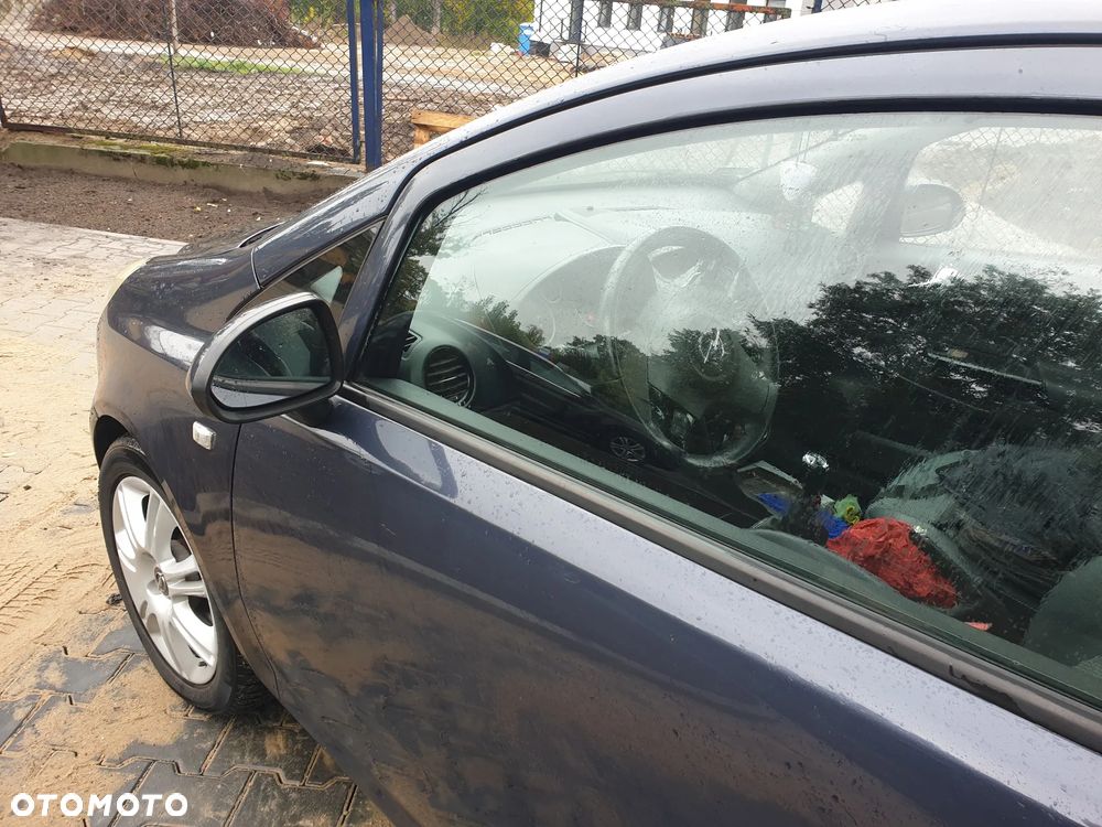Opel Corsa 1.4 16V Cosmo - 6