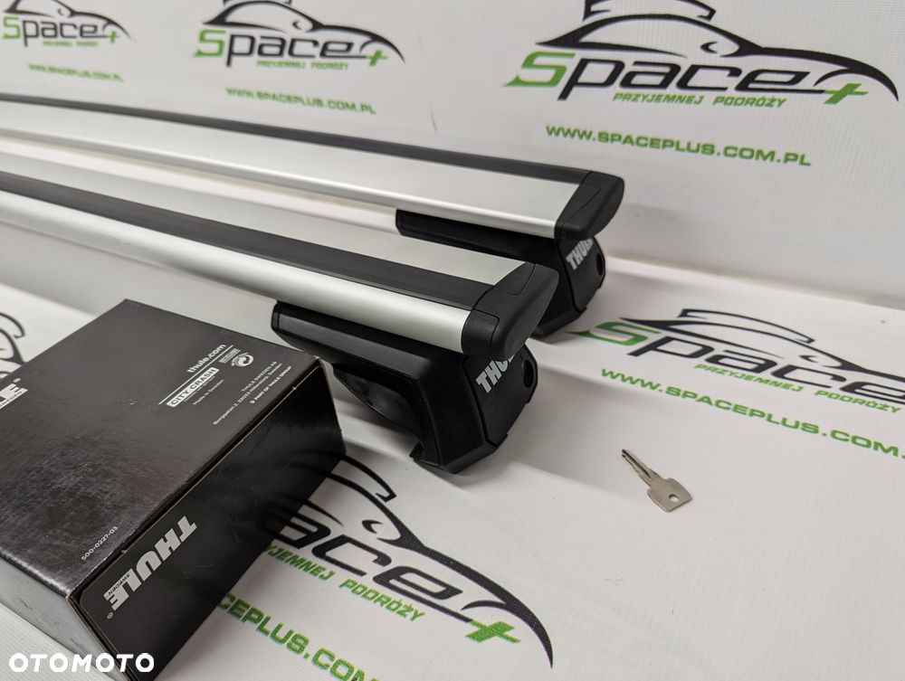 Bagażnik dachowy Thule: belki 960 + Stopy 7104 Na otwarte relingi - 2