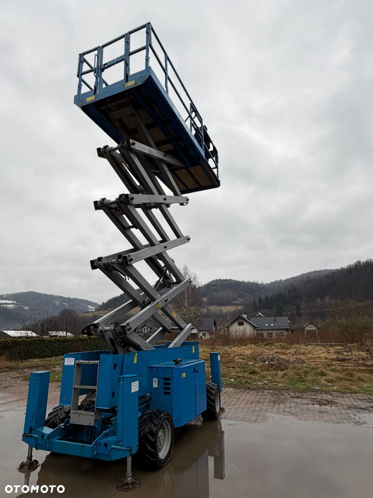 Genie Zwyżka Terenowa GS-4069RT Podnośnik Nożycowy Dźwig 14,5 metra jak Nowa z salonu! 960 mtg. 2013 rok, Pochodzi z Norweskiego urzędu Komuny. Zadbana! 4x4 Silnik Kubota. Zero Luzów i wycieków. Aktualne Serwisy DEKRA BMWT. Wysuwany Balkon. Sterowana z dołu i góry. Okazja Tanio !! Dokumentacja! Bez DPF, adBLUE - 10