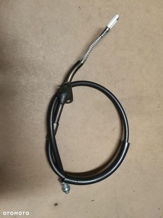 Linka hamulca ręcznego tył L (1013mm) MERCEDES T2/LN1 OM354.901-OM364.987 04.86-12.94 DB809