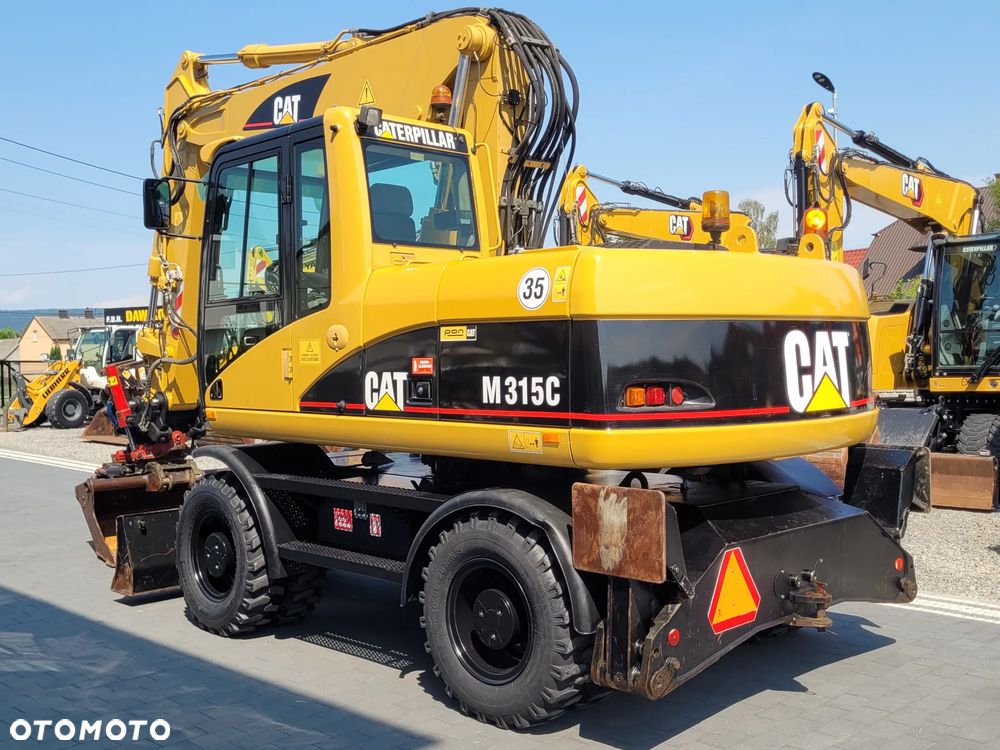 Caterpillar M315C / ROTOTILT ze szczypcami / ZADBANY EGZEMPLARZ / - 6