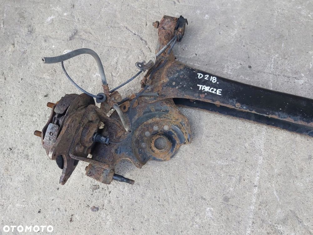 Toyota Yaris I belka zawieszenia tył bębny ABS pod TARCZE tarczobęben - 1