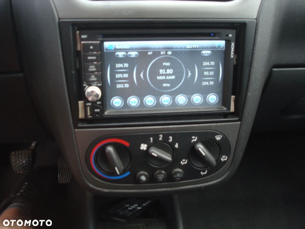 Opel Corsa 1.4 16V Cosmo - 31