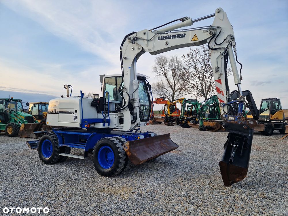 Liebherr A 311 Litronic - 3