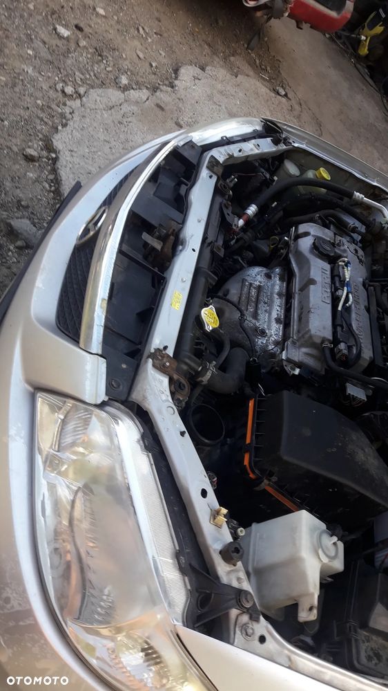 Mazda 323 323f BJ 98-03 Lift  Maska lampa zderzak pas atrapa 22V - 5