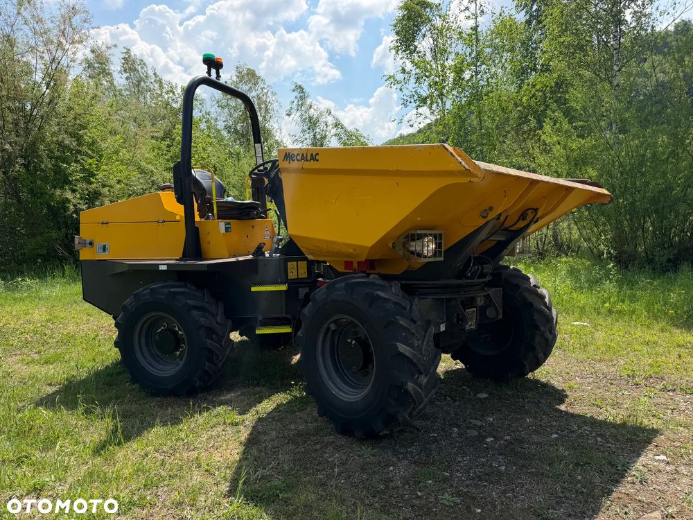 Terex Mecalac TA6s Wozidło wózek z Obrotową Kolebą. 6 ton ładowność. 4x4. Silnik Perkins. 4 cylindry. 808 mtg. 2022 rok. Kamera z wielkim Ekranem! Jazda Rewers 3prędkości. Maszyna jak Nowa z Norweskiego Gospodarstwa! Ani deka luzów i wycieków! Hydrostatic. Pełny Oryginał. Hamulce brzytwa. Serwisy w DEKRA. Maszyna Woziła lekkie ładunki. Praktycznie zerowe zużycie. Wielka Okazja. Wszystko w pełnym Oryginale. Opony Oryginał wszystkie jak Nowe. Komendy Głosowe w maszynie! - 1