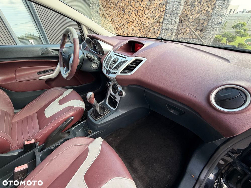 Ford Fiesta 1.4 Ghia - 12