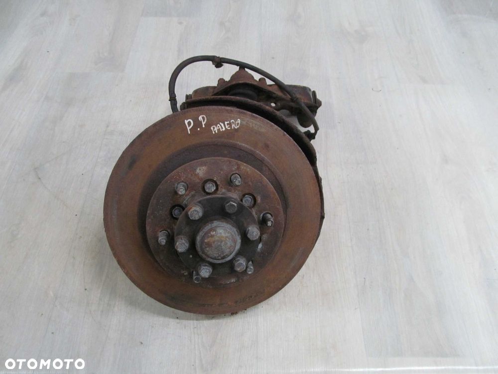 MITSUBISHI PAJERO 91-01 PIASTA ZWROTNICA PRAWY PRZOD - 1