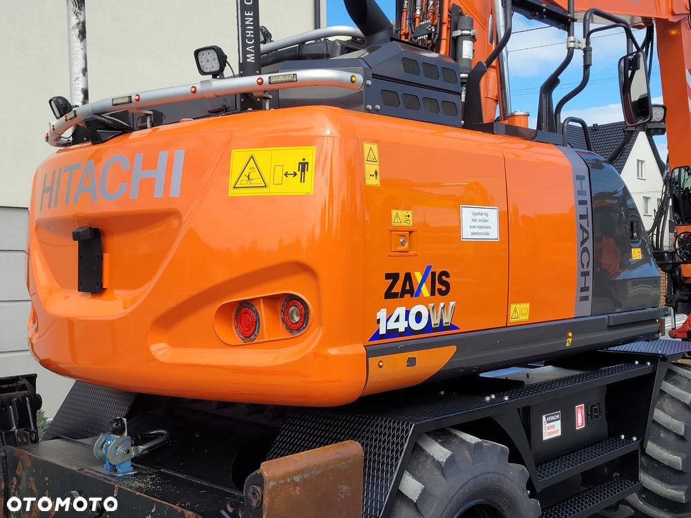 Hitachi ZX 140W / ROTOTILT ze szczypcami / system GPS 3D LEICA / - 16
