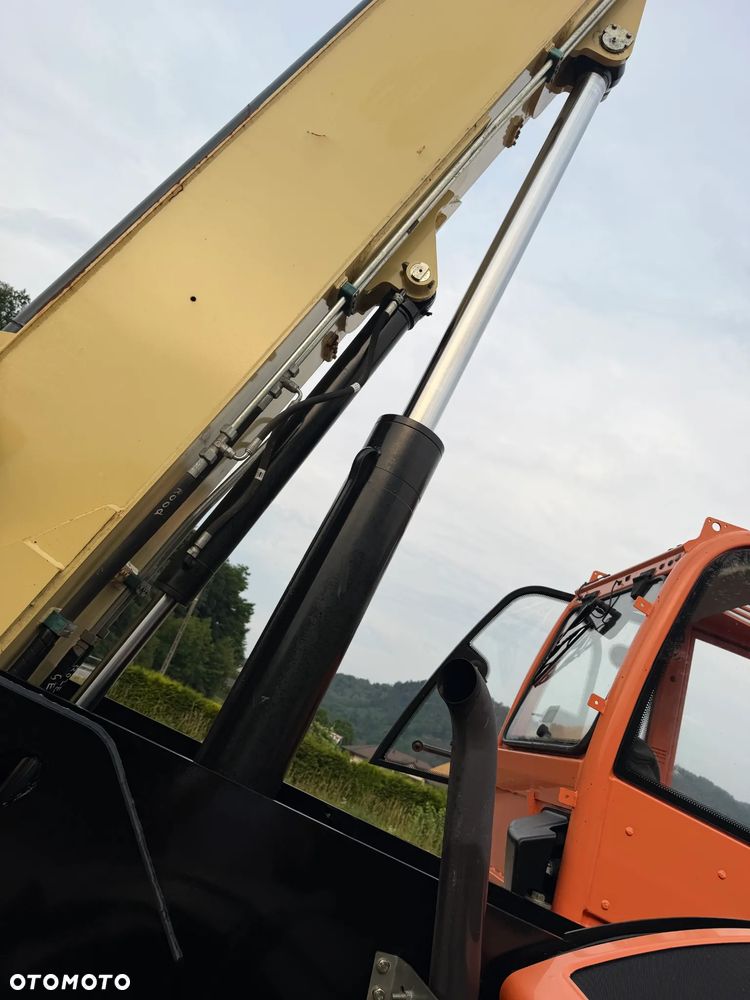 JLG 3614RS CAT Ładowarka Teleskopowa Dźwig Zwyżka 14 metrów wysuw. Udźwig 4 tony. Widły. Silnik DEUTZ TuRBO. 110KM. Maszyna jak Nowa z Norwegii Pracowała w Urzędzie Komunalnym.  DEKRA BMWT. skręt 3 tryby 4 koła KRAB. Auto-poziomowanie!  Zero luzów wycieków jak Nowa z salonu. Małe Gabaryty maszyny a potężny zasięg i udzwig! Skrzynia Hydrostatic 3 biegi. Zmiana na Pokrętle przy kierownicy. Wszystko Sterowane z 1 dżojstkika wraz z łapami! OKAZJA. Zero luzów. Ładowarka ma nadzwyczajnie duży prześwit od spodu. Opony jak Nowe! OKAZJA  2017 rok. Niski przebieg 3000mtg - 9