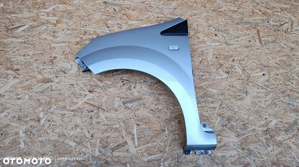 BŁOTNIK LEWY KIEROWCY SREBRNY RENAULT TWINGO II 2 2012 1.2B LIFT TEB69