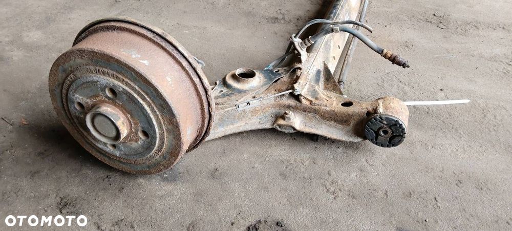 BELKA OŚ ZAWIESZENIA TYŁ BĘBNY Z ABS OPEL CORSA C HB 3D - 5