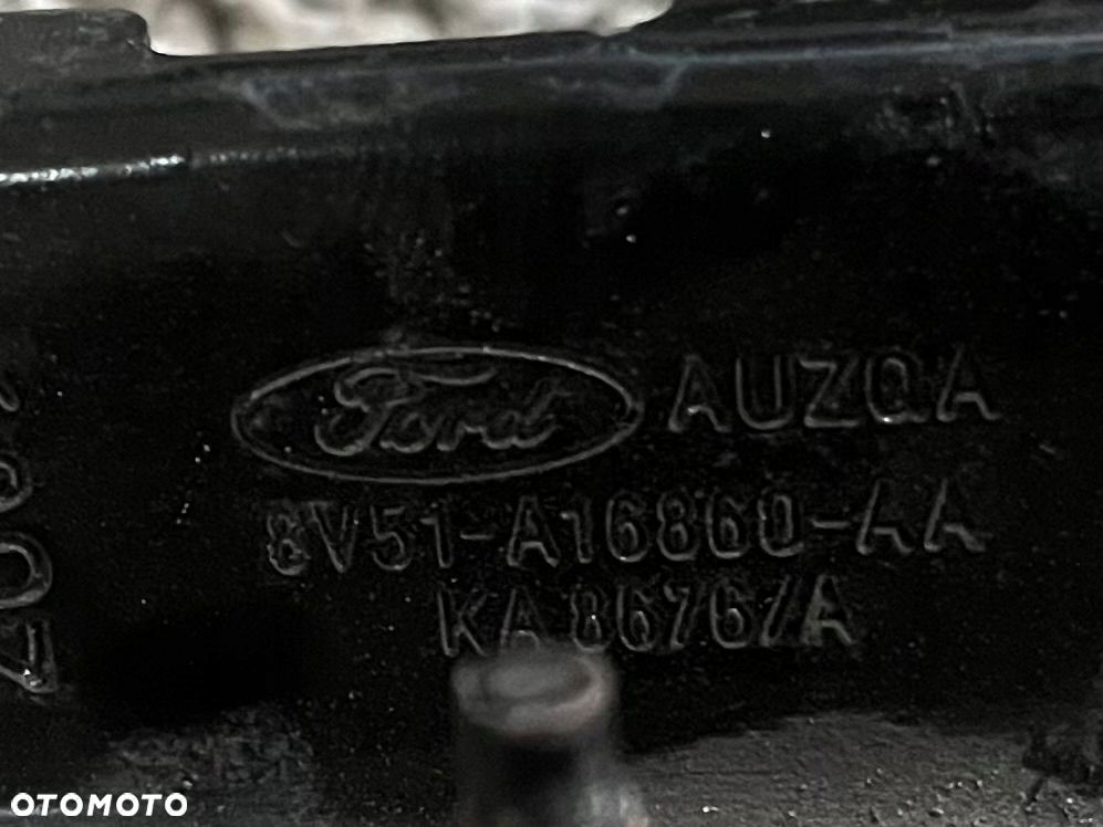 8V51-A16860-AA UCHWYT ZAMKA MASKI FORD FIESTA MK7 - 5