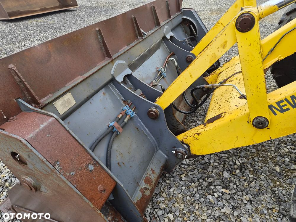 New Holland LB 115 - 22