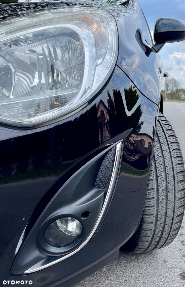 Opel Corsa 1.2 16V Cosmo - 30