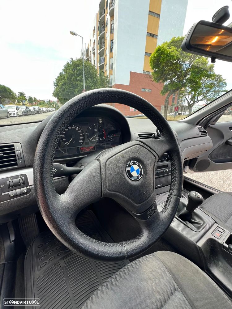 BMW 320 d — fotografia 14