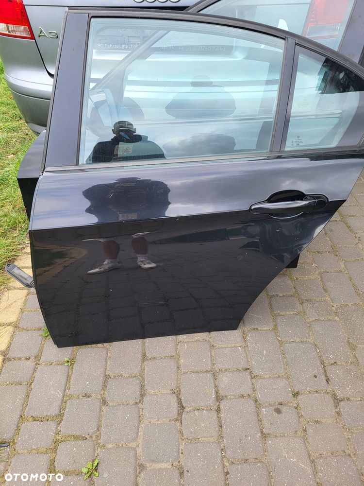 Drzwi tylne lewe bmw e90 07r sedan lakier black sapphire kompletne