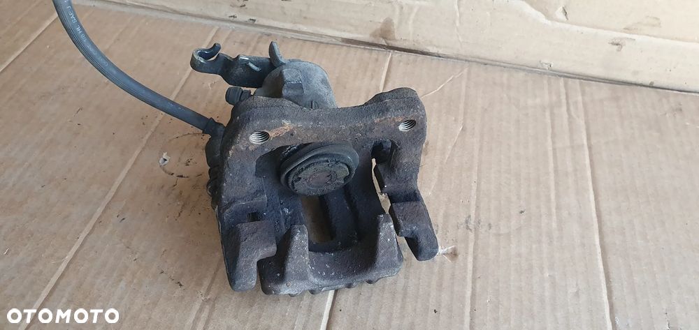 Zacisk hamulcowy lewy tył tylny Audi A3 8P - 6
