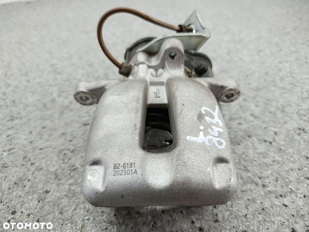 ZACISK HAMULCOWY LEWY TYŁ VW PASSAT B6 2.0 TDI - 4