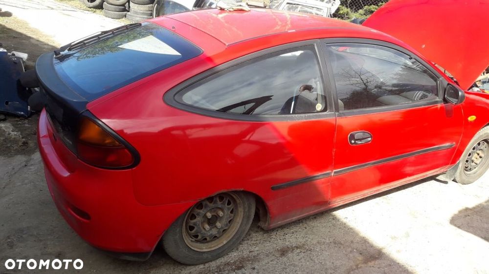 Mazda 323 C ba szyba tylna karoseryjna prawa Lewa - 3