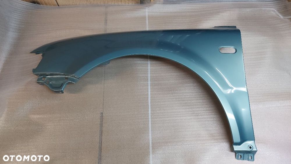 PASSAT B5 96-00 rok BŁOTNIK LEWY LB6N CYNK. - 1