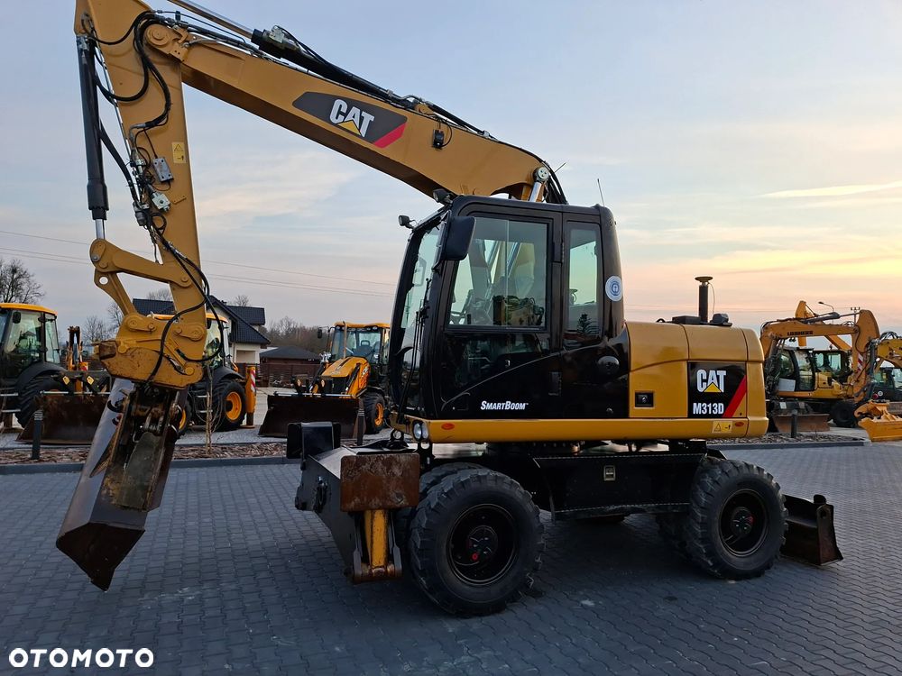 Caterpillar CAT M313D Niwelacja 3D Leica - 10