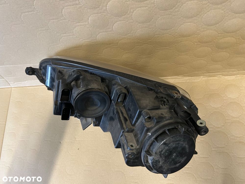 Lampa przednia prawa VW Golf V Jetta Hella Europejska - 4