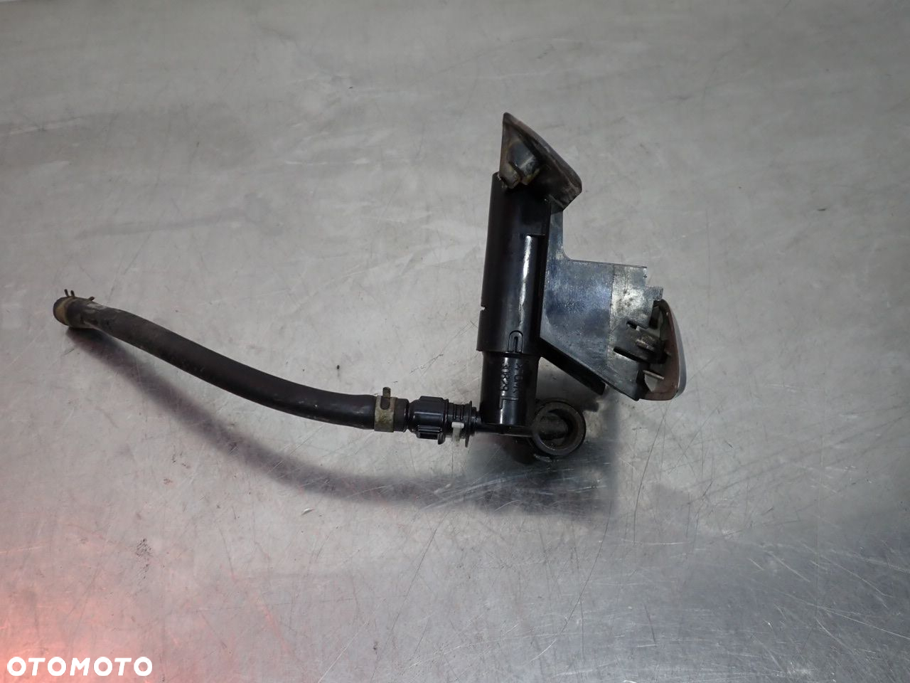 SPRYSKIWACZ LAMPY REFLEKTORA LEWY TOYOTA COROLLA E15 - 5