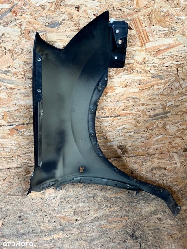 BŁOTNIK LEWY NISSAN QASHQAI J10 Kod lakieru: Z11 - 9