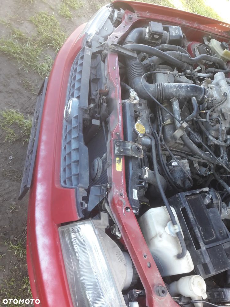 Mazda Demio 97-03 Drzwi prawe przednie tył błotnik w kolor SU  szyba zderzak lampaprzód - 11