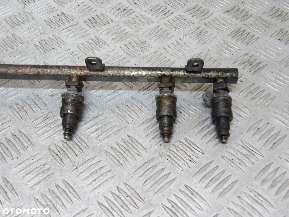 JEEP GRAND CHEROKEE ZJ XJ 4.0 LISTWA WTRYSKOWA WTRYSKI KPL. - 7