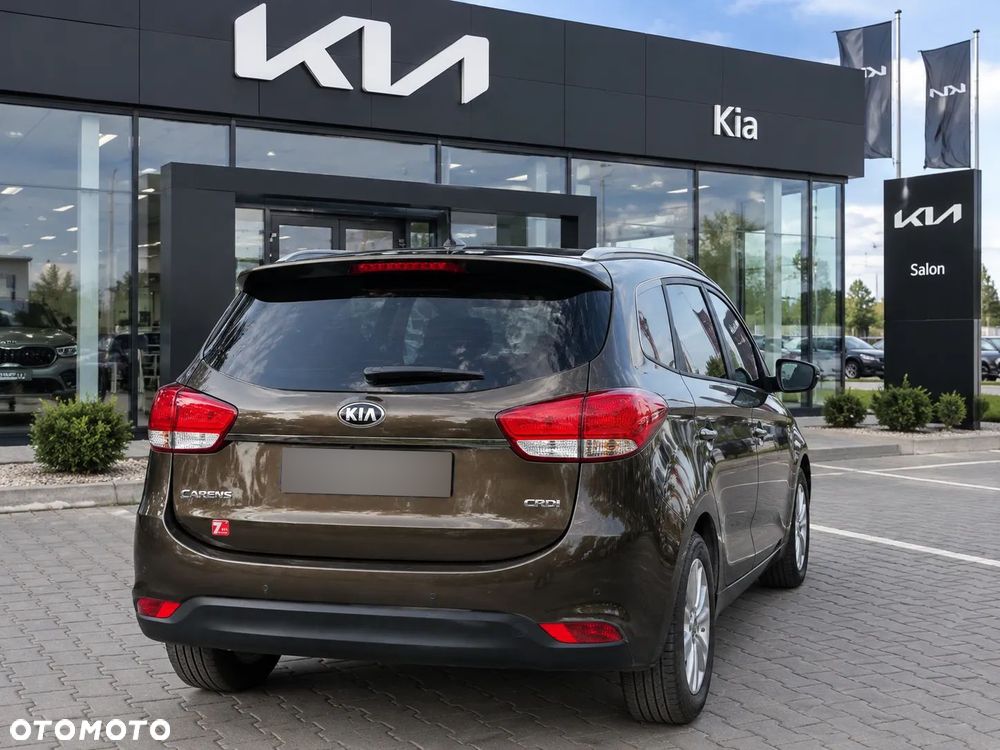 Kia Carens - 4