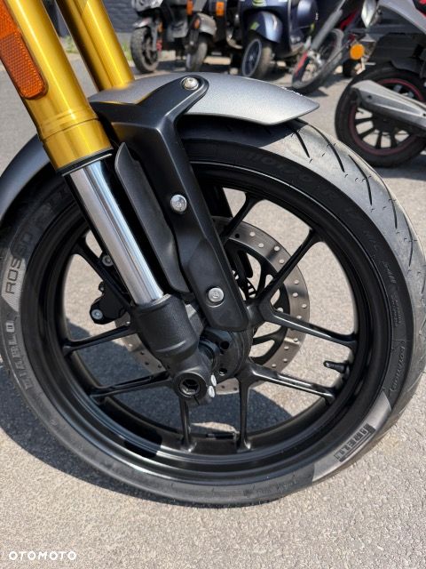 Triumph Inny - 9