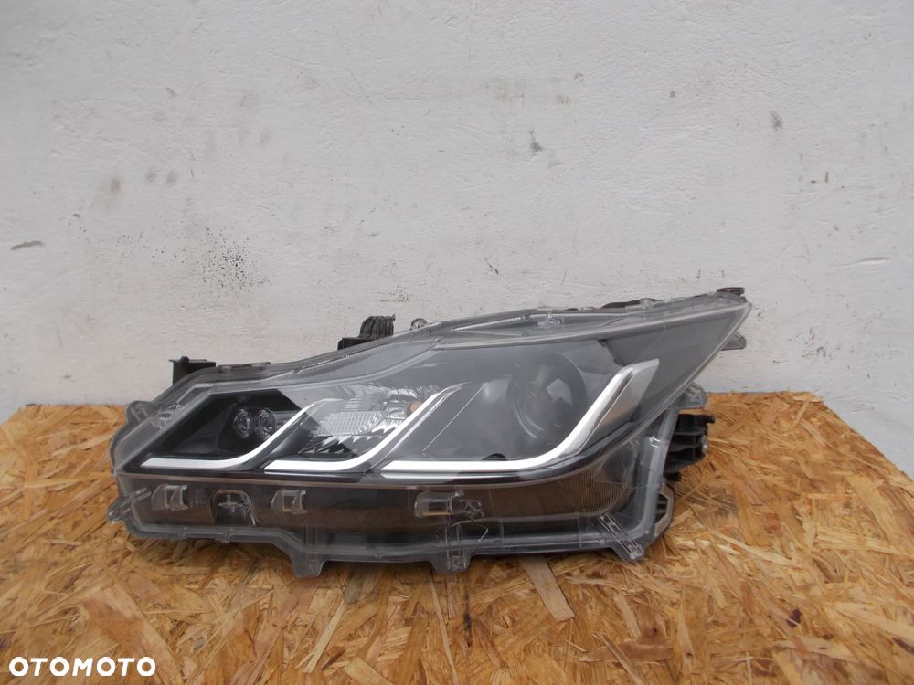 TOYOTA COROLLA E21 SEDAN LAMPA LEWA 81150-02T30-00 - 1