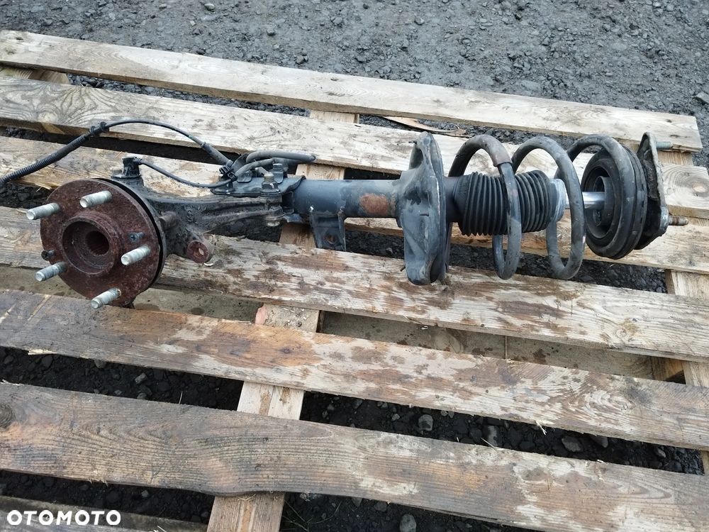 KIA CEED HYUNDAI I30 AMORTYZATOR ZWROTNICA LEWA