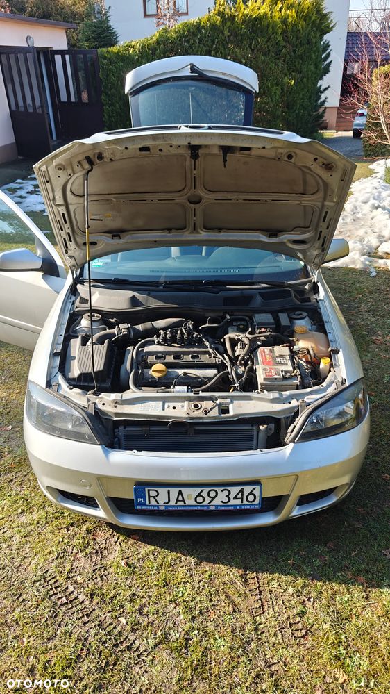 Opel Astra 1.8 Sport - 27