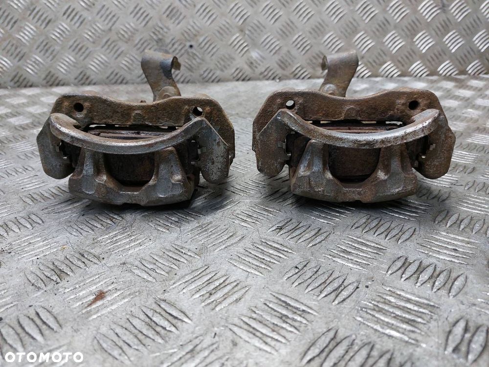 TARCZE HAMULCOWE TYŁ + KLOCKI + ZACISKI MAZDA 323F BJ 2.0 TD - 9