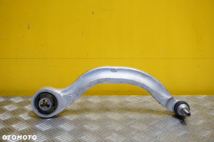 TESLA Y 2020 - 2023 Wahacz Lewy Przód - 1