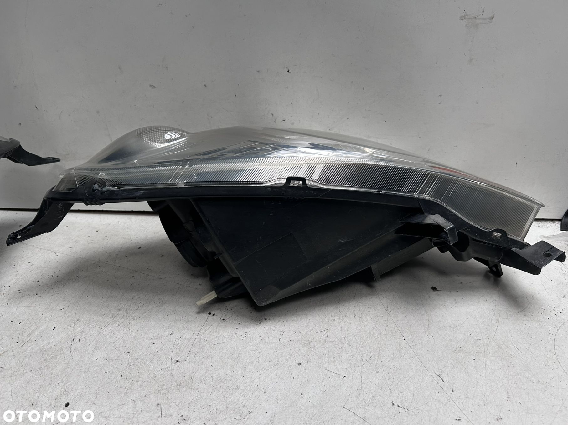 Reflektory Nissan Note E11 - 6