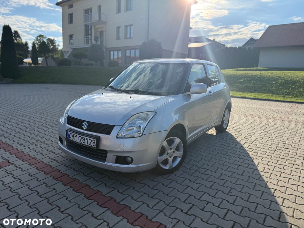 Suzuki Swift 1.3 GS / Premium 4WD - 1