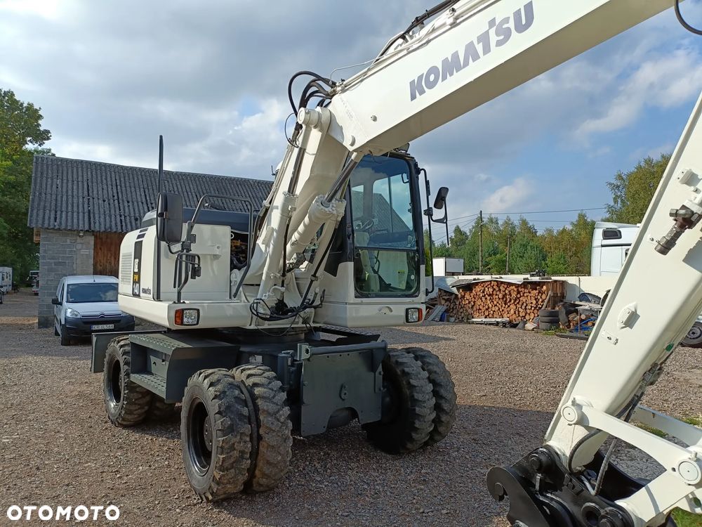 Komatsu PW 140 - 26