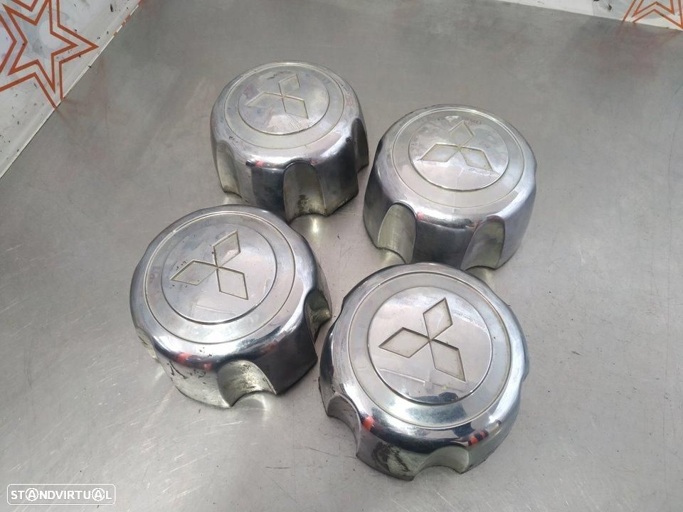 CALOTAS MITSUBISHI L200 K70 - 1