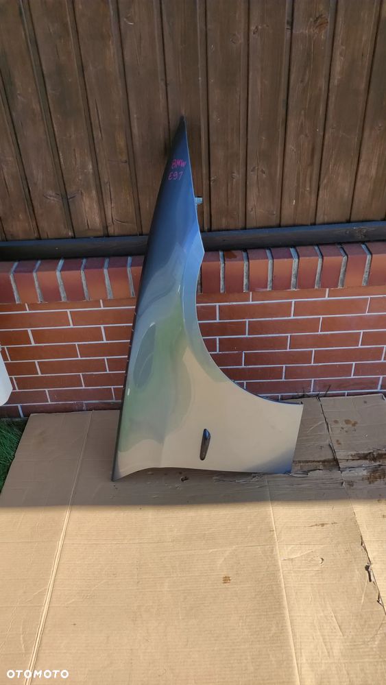 Prawy przedni błotnik BMW E91 oryginał