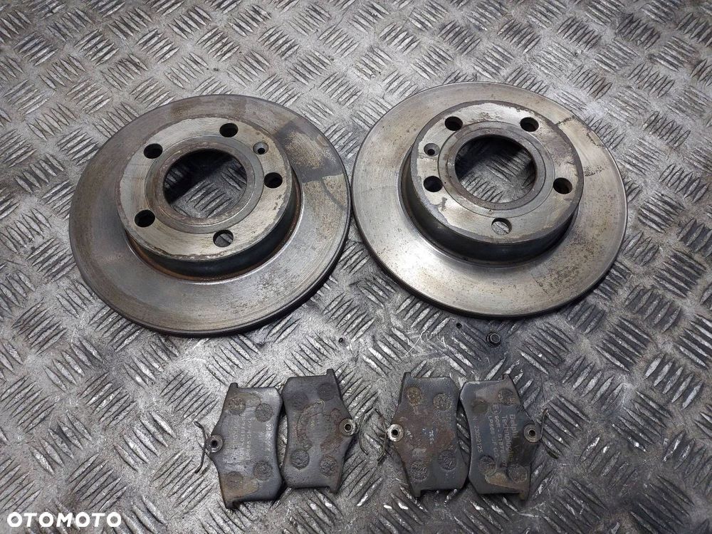 TARCZE HAMULCOWE TYŁ + KLOCKI AUDI A4 B6 - 1