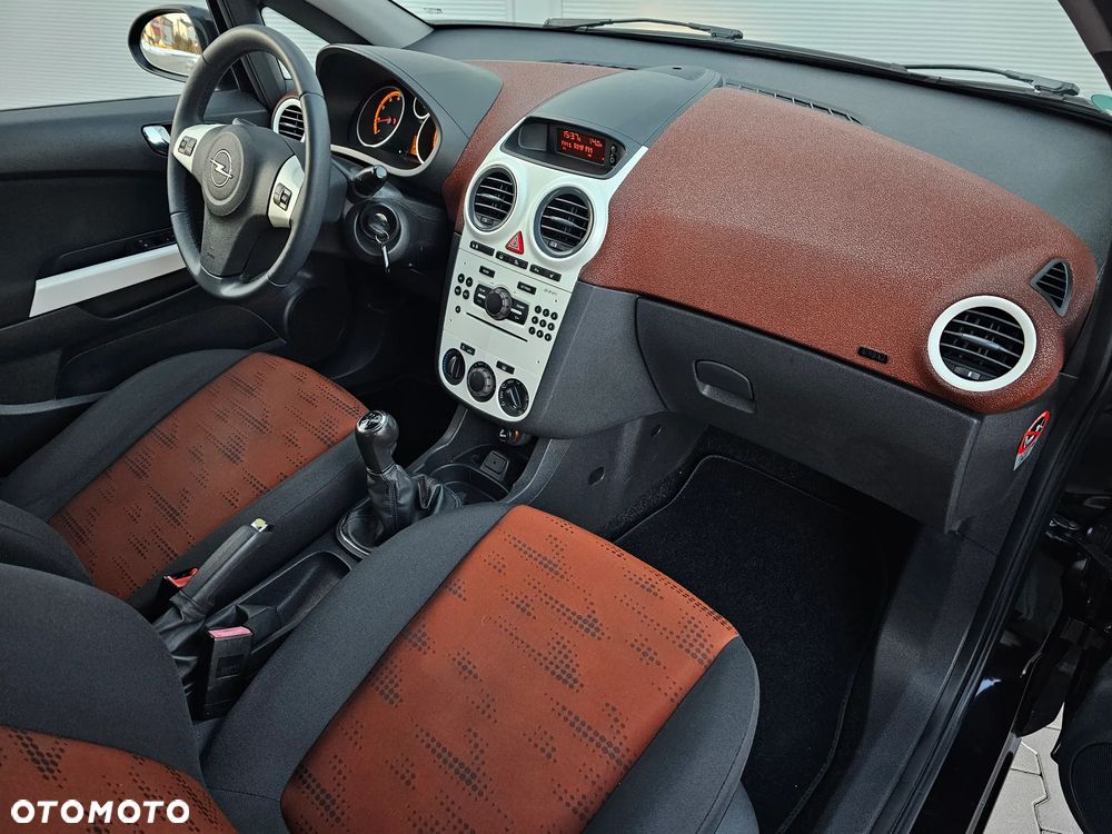 Opel Corsa 1.4 16V Satellite - 30