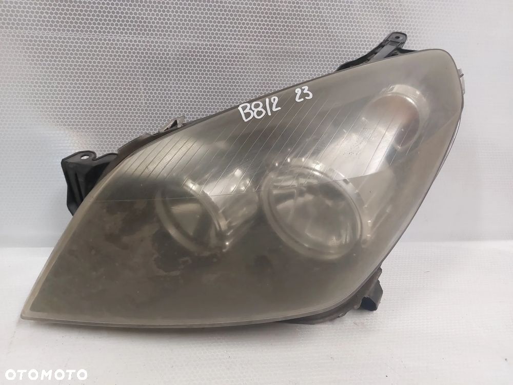 .  LAMPA PRZOD PRZEDNIA LEWA OPEL ASTRA H - 1